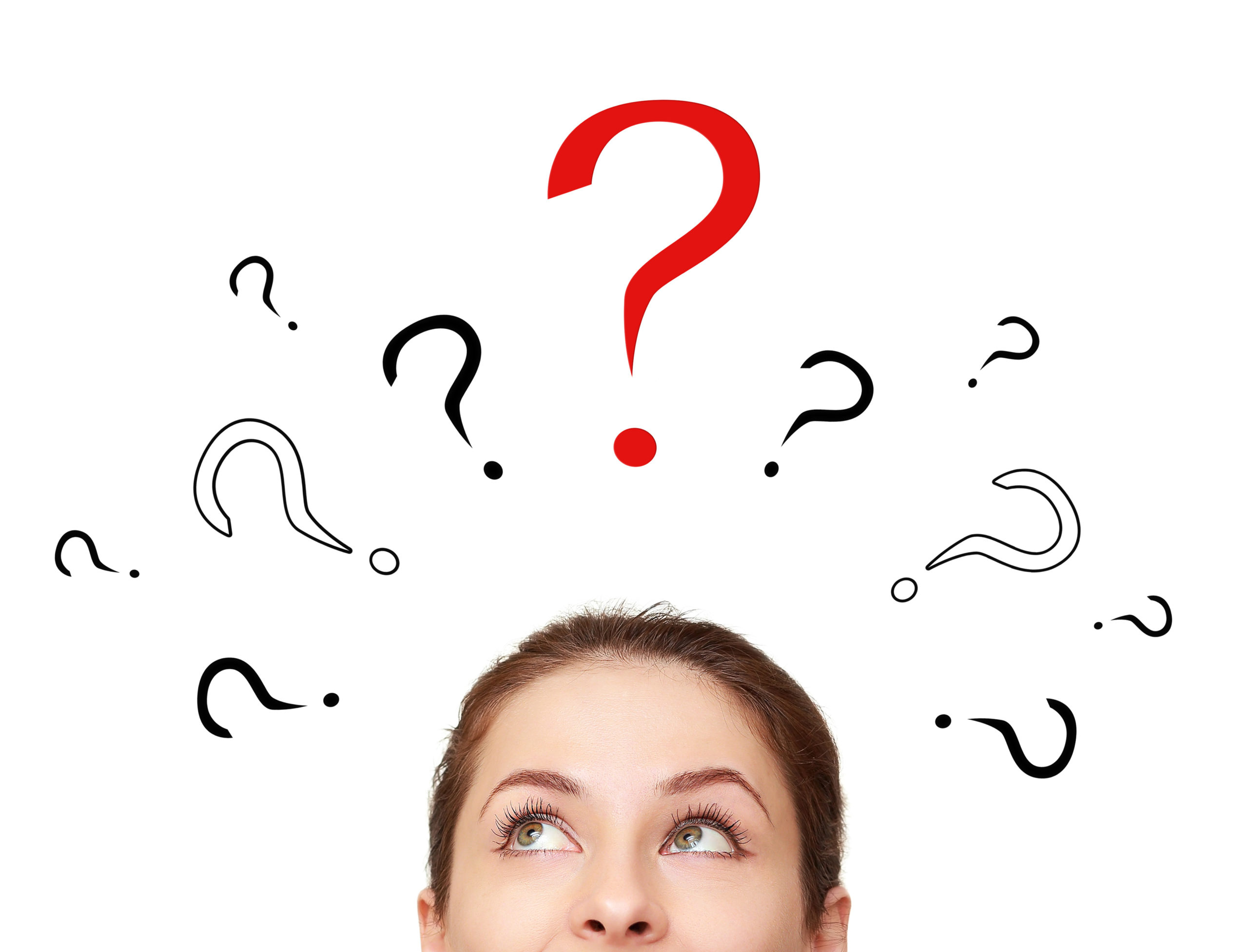 Woman looking upwards with question marks overhead, indicating curiosity or confusion.