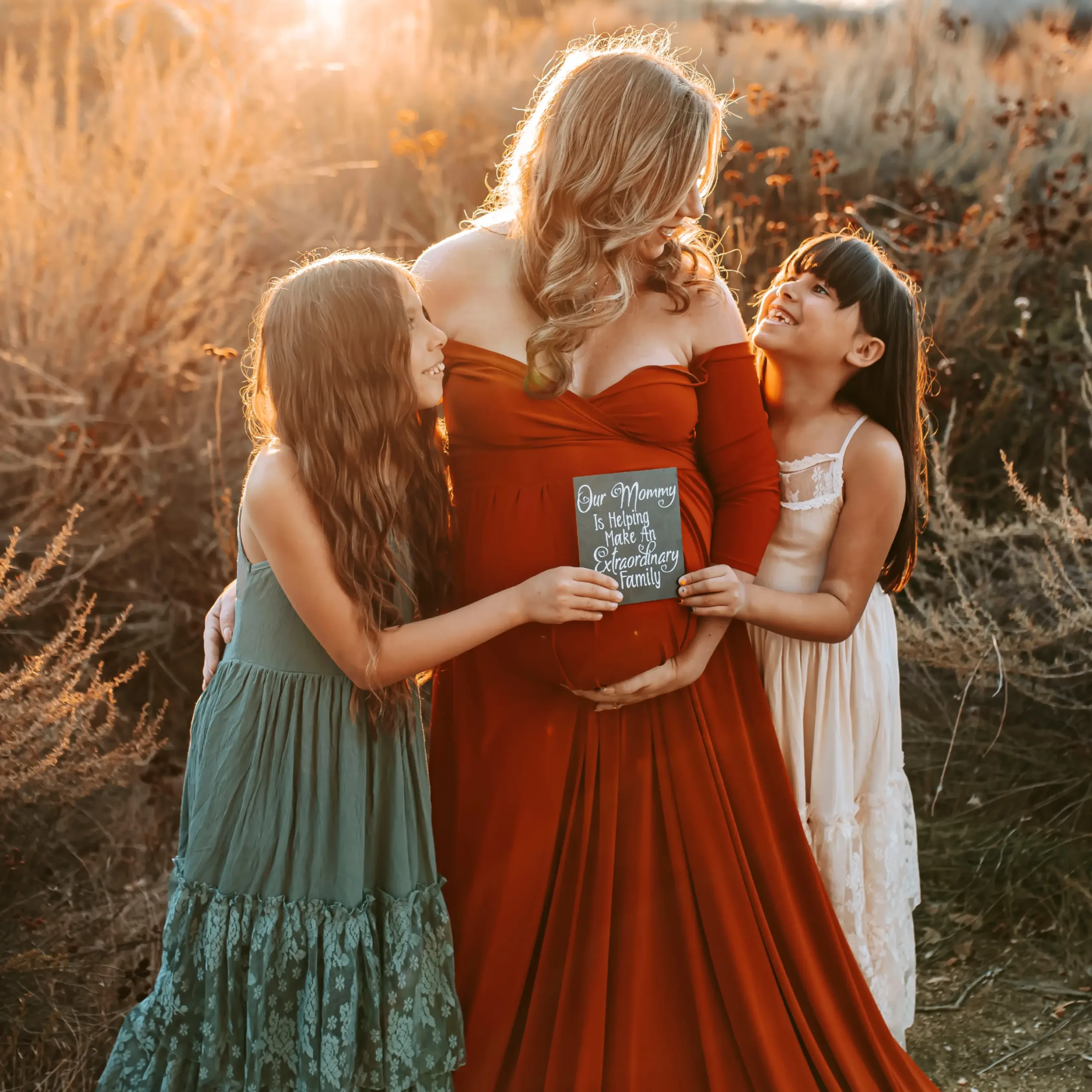 3 time surrogate mother showing her pregnancy